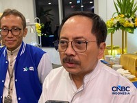 Direktur and Chief Regulatory Officer XLSMART, Merza Fachys, ditemui di Jakarta, Jumat malam (13/3/2026). (CNCB Indonesia/Novina)