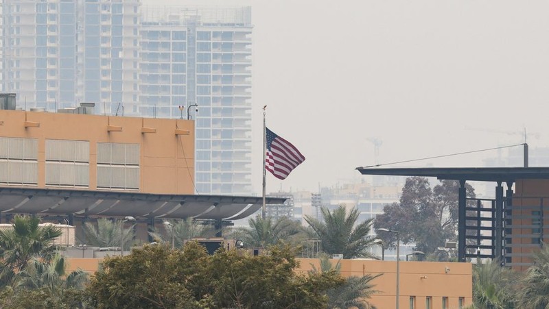 Smoke rises from the U.S. embassy building, after Iraqi security sources said the embassy was hit in a missile attack, in Baghdad, Iraq March 14, 2026 in this screen grab obtained from a social media video. SOCIAL MEDIA/via REUTERS  THIS IMAGE HAS BEEN SUPPLIED BY A THIRD PARTY.  NEWS USE ONLY. NO RESALES. NO ARCHIVES. BEST QUALITY AVAILABLE. VERIFICATION - Reuters was able to confirm the video from the shape and location of buildings and a water body which matched file and satellite imagery of the area. Date was verified by Iraqi security sources and media reports. Multiple corroborating videos showed smoke rising from the building. No older versions of the video were found posted online before March 14