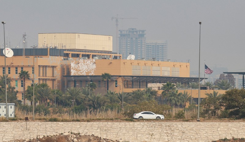 Smoke rises from the U.S. embassy building, after Iraqi security sources said the embassy was hit in a missile attack, in Baghdad, Iraq March 14, 2026 in this screen grab obtained from a social media video. SOCIAL MEDIA/via REUTERS  THIS IMAGE HAS BEEN SUPPLIED BY A THIRD PARTY.  NEWS USE ONLY. NO RESALES. NO ARCHIVES. BEST QUALITY AVAILABLE. VERIFICATION - Reuters was able to confirm the video from the shape and location of buildings and a water body which matched file and satellite imagery of the area. Date was verified by Iraqi security sources and media reports. Multiple corroborating videos showed smoke rising from the building. No older versions of the video were found posted online before March 14