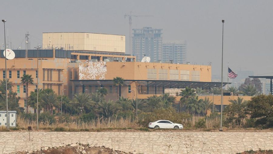 Smoke rises from the U.S. embassy building, after Iraqi security sources said the embassy was hit in a missile attack, in Baghdad, Iraq March 14, 2026 in this screen grab obtained from a social media video. SOCIAL MEDIA/via REUTERS  THIS IMAGE HAS BEEN SUPPLIED BY A THIRD PARTY.  NEWS USE ONLY. NO RESALES. NO ARCHIVES. BEST QUALITY AVAILABLE. VERIFICATION - Reuters was able to confirm the video from the shape and location of buildings and a water body which matched file and satellite imagery of the area. Date was verified by Iraqi security sources and media reports. Multiple corroborating videos showed smoke rising from the building. No older versions of the video were found posted online before March 14