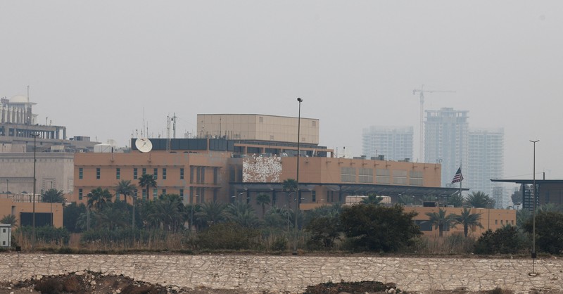 Smoke rises from the U.S. embassy building, after Iraqi security sources said the embassy was hit in a missile attack, in Baghdad, Iraq March 14, 2026 in this screen grab obtained from a social media video. SOCIAL MEDIA/via REUTERS  THIS IMAGE HAS BEEN SUPPLIED BY A THIRD PARTY.  NEWS USE ONLY. NO RESALES. NO ARCHIVES. BEST QUALITY AVAILABLE. VERIFICATION - Reuters was able to confirm the video from the shape and location of buildings and a water body which matched file and satellite imagery of the area. Date was verified by Iraqi security sources and media reports. Multiple corroborating videos showed smoke rising from the building. No older versions of the video were found posted online before March 14