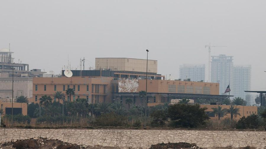 Smoke rises from the U.S. embassy building, after Iraqi security sources said the embassy was hit in a missile attack, in Baghdad, Iraq March 14, 2026 in this screen grab obtained from a social media video. SOCIAL MEDIA/via REUTERS  THIS IMAGE HAS BEEN SUPPLIED BY A THIRD PARTY.  NEWS USE ONLY. NO RESALES. NO ARCHIVES. BEST QUALITY AVAILABLE. VERIFICATION - Reuters was able to confirm the video from the shape and location of buildings and a water body which matched file and satellite imagery of the area. Date was verified by Iraqi security sources and media reports. Multiple corroborating videos showed smoke rising from the building. No older versions of the video were found posted online before March 14