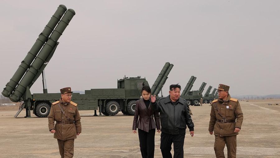 North Korean leader Kim Jong Un, accompanied by his daughter Kim Ju Ae, oversees the test-launch of 600 mm-calibre multiple rocket launchers, North Korea, March 14, 2026, in this picture released by North Korea's official Korean Central News Agency.  KCNA via REUTERS    ATTENTION EDITORS - THIS IMAGE WAS PROVIDED BY A THIRD PARTY. REUTERS IS UNABLE TO INDEPENDENTLY VERIFY THIS IMAGE. NO THIRD PARTY SALES. SOUTH KOREA OUT. NO COMMERCIAL OR EDITORIAL SALES IN SOUTH KOREA.