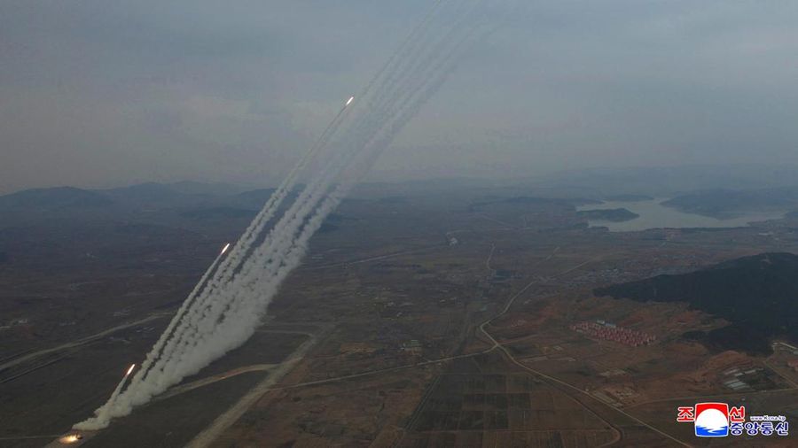 North Korean leader Kim Jong Un, accompanied by his daughter Kim Ju Ae, oversees the test-launch of 600 mm-calibre multiple rocket launchers, North Korea, March 14, 2026, in this picture released by North Korea's official Korean Central News Agency.  KCNA via REUTERS    ATTENTION EDITORS - THIS IMAGE WAS PROVIDED BY A THIRD PARTY. REUTERS IS UNABLE TO INDEPENDENTLY VERIFY THIS IMAGE. NO THIRD PARTY SALES. SOUTH KOREA OUT. NO COMMERCIAL OR EDITORIAL SALES IN SOUTH KOREA.