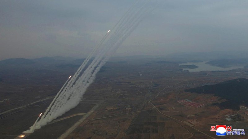 North Korean leader Kim Jong Un, accompanied by his daughter Kim Ju Ae, oversees the test-launch of 600 mm-calibre multiple rocket launchers, North Korea, March 14, 2026, in this picture released by North Korea's official Korean Central News Agency.  KCNA via REUTERS    ATTENTION EDITORS - THIS IMAGE WAS PROVIDED BY A THIRD PARTY. REUTERS IS UNABLE TO INDEPENDENTLY VERIFY THIS IMAGE. NO THIRD PARTY SALES. SOUTH KOREA OUT. NO COMMERCIAL OR EDITORIAL SALES IN SOUTH KOREA.