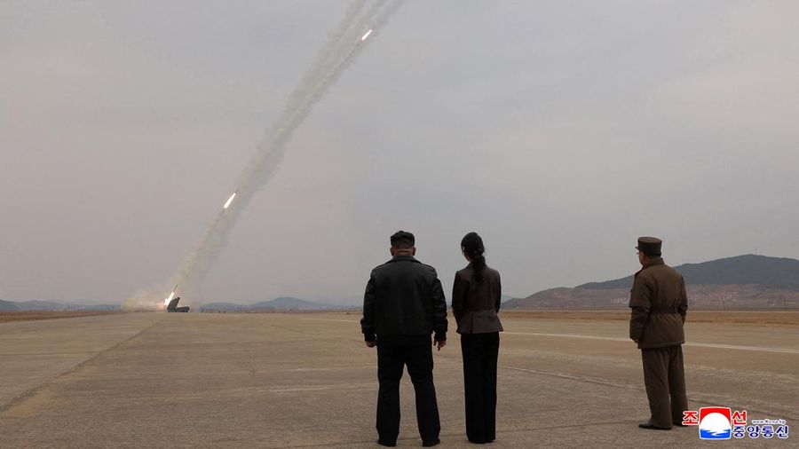 North Korean leader Kim Jong Un, accompanied by his daughter Kim Ju Ae, oversees the test-launch of 600 mm-calibre multiple rocket launchers, North Korea, March 14, 2026, in this picture released by North Korea's official Korean Central News Agency.  KCNA via REUTERS    ATTENTION EDITORS - THIS IMAGE WAS PROVIDED BY A THIRD PARTY. REUTERS IS UNABLE TO INDEPENDENTLY VERIFY THIS IMAGE. NO THIRD PARTY SALES. SOUTH KOREA OUT. NO COMMERCIAL OR EDITORIAL SALES IN SOUTH KOREA.