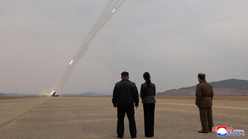 North Korean leader Kim Jong Un, accompanied by his daughter Kim Ju Ae, oversees the test-launch of 600 mm-calibre multiple rocket launchers, North Korea, March 14, 2026, in this picture released by North Korea's official Korean Central News Agency.  KCNA via REUTERS    ATTENTION EDITORS - THIS IMAGE WAS PROVIDED BY A THIRD PARTY. REUTERS IS UNABLE TO INDEPENDENTLY VERIFY THIS IMAGE. NO THIRD PARTY SALES. SOUTH KOREA OUT. NO COMMERCIAL OR EDITORIAL SALES IN SOUTH KOREA.