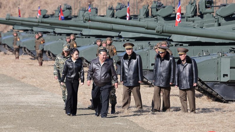 North Korean leader Kim Jong Un and his daughter Kim Ju Ae ride a tank during what North Korean state news agency KCNA reports is an offensive tactical drill involving a new type of tank, at a training base in Pyongyang, North Korea, March 19, 2026, in this picture released by North Korea's official Korean Central News Agency. KCNA via REUTERS ATTENTION EDITORS - THIS IMAGE WAS PROVIDED BY A THIRD PARTY. REUTERS IS UNABLE TO INDEPENDENTLY VERIFY THIS IMAGE. NO THIRD PARTY SALES. SOUTH KOREA OUT. NO COMMERCIAL OR EDITORIAL SALES IN SOUTH KOREA.     TPX IMAGES OF THE DAY