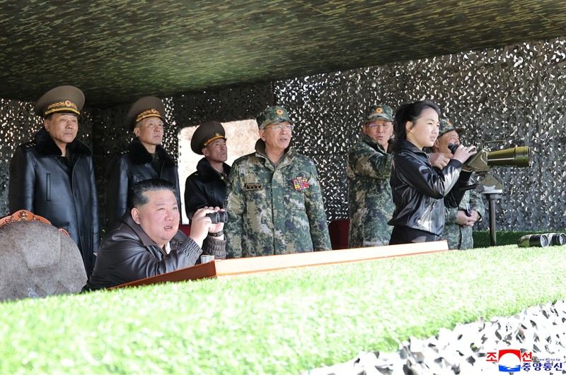 North Korean leader Kim Jong Un and his daughter Kim Ju Ae ride a tank during what North Korean state news agency KCNA reports is an offensive tactical drill involving a new type of tank, at a training base in Pyongyang, North Korea, March 19, 2026, in this picture released by North Korea's official Korean Central News Agency. KCNA via REUTERS ATTENTION EDITORS - THIS IMAGE WAS PROVIDED BY A THIRD PARTY. REUTERS IS UNABLE TO INDEPENDENTLY VERIFY THIS IMAGE. NO THIRD PARTY SALES. SOUTH KOREA OUT. NO COMMERCIAL OR EDITORIAL SALES IN SOUTH KOREA.     TPX IMAGES OF THE DAY
