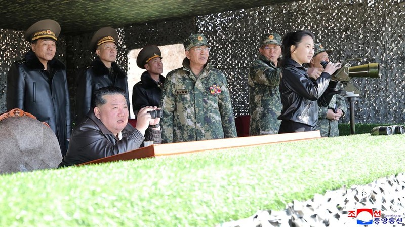 North Korean leader Kim Jong Un and his daughter Kim Ju Ae ride a tank during what North Korean state news agency KCNA reports is an offensive tactical drill involving a new type of tank, at a training base in Pyongyang, North Korea, March 19, 2026, in this picture released by North Korea's official Korean Central News Agency. KCNA via REUTERS ATTENTION EDITORS - THIS IMAGE WAS PROVIDED BY A THIRD PARTY. REUTERS IS UNABLE TO INDEPENDENTLY VERIFY THIS IMAGE. NO THIRD PARTY SALES. SOUTH KOREA OUT. NO COMMERCIAL OR EDITORIAL SALES IN SOUTH KOREA.     TPX IMAGES OF THE DAY