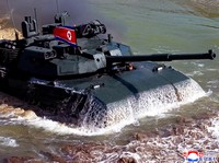 A tank manoeuvres in what North Korean state news agency KCNA reports is an offensive tactical drill involving a new type of tank, at a training base in Pyongyang, North Korea, March 19, 2026, in this picture released by North Korea's official Korean