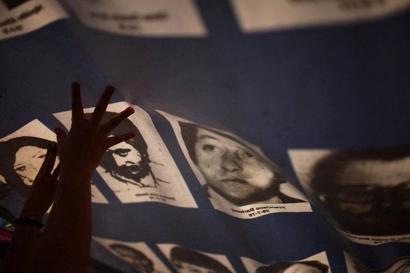 A drone view shows people participating in a demonstration to mark the 50th anniversary of the 1976 military coup, at Plaza de Mayo square in Buenos Aires, Argentina March 24, 2026. REUTERS/Agustin Marcarian