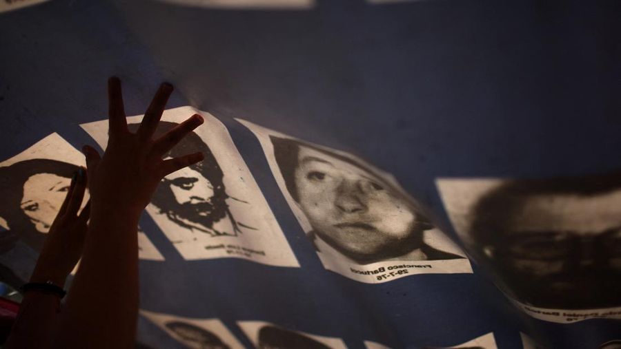 A drone view shows people participating in a demonstration to mark the 50th anniversary of the 1976 military coup, at Plaza de Mayo square in Buenos Aires, Argentina March 24, 2026. REUTERS/Agustin Marcarian