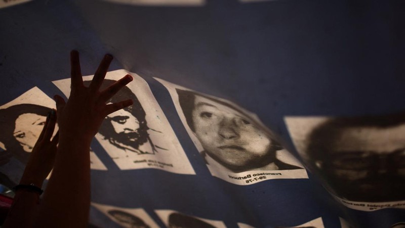 A drone view shows people participating in a demonstration to mark the 50th anniversary of the 1976 military coup, at Plaza de Mayo square in Buenos Aires, Argentina March 24, 2026. REUTERS/Agustin Marcarian