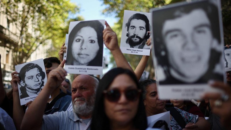 A drone view shows people participating in a demonstration to mark the 50th anniversary of the 1976 military coup, at Plaza de Mayo square in Buenos Aires, Argentina March 24, 2026. REUTERS/Agustin Marcarian