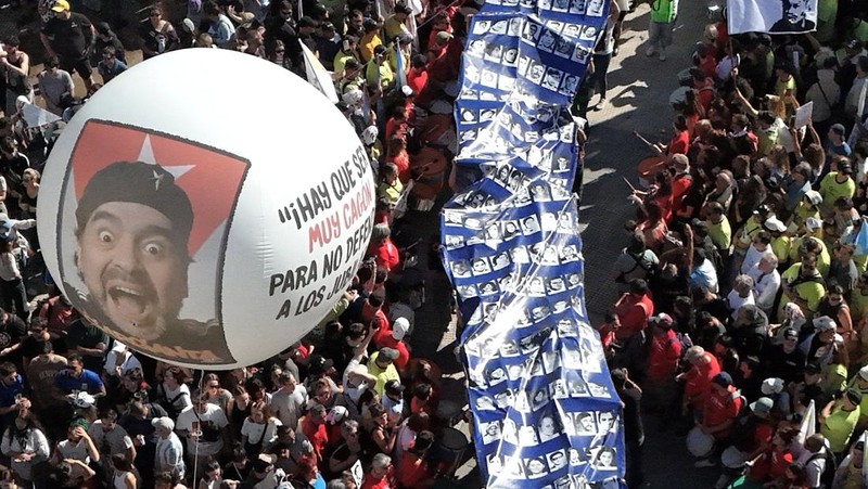 A drone view shows people participating in a demonstration to mark the 50th anniversary of the 1976 military coup, at Plaza de Mayo square in Buenos Aires, Argentina March 24, 2026. REUTERS/Agustin Marcarian
