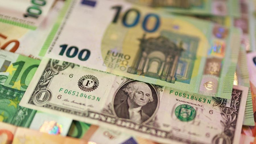 U.S. dollar and Euro banknotes are seen in this illustration taken March 24, 2026. REUTERS/Dado Ruvic/Illustration