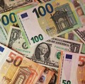 U.S. dollar and Euro banknotes are seen in this illustration taken March 24, 2026. REUTERS/Dado Ruvic/Illustration