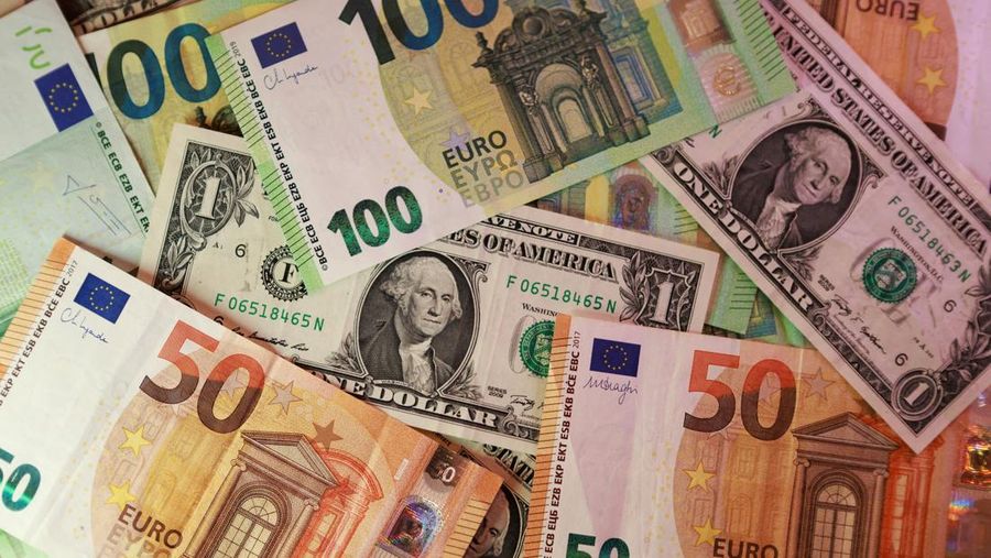 U.S. dollar and Euro banknotes are seen in this illustration taken March 24, 2026. REUTERS/Dado Ruvic/Illustration