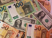 U.S. dollar and Euro banknotes are seen in this illustration taken March 24, 2026. REUTERS/Dado Ruvic/Illustration