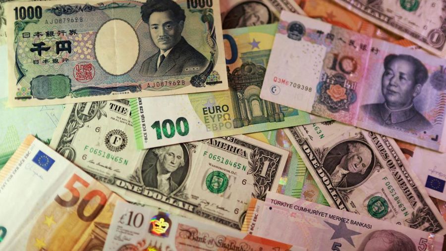 U.S. dollar, Euro, Yen, Pound, Turkish Lira, Yuan banknotes are seen in this illustration taken March 24, 2026. REUTERS/Dado Ruvic/Illustration