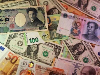 U.S. dollar, Euro, Yen, Pound, Turkish Lira, Yuan banknotes are seen in this illustration taken March 24, 2026. REUTERS/Dado Ruvic/Illustration