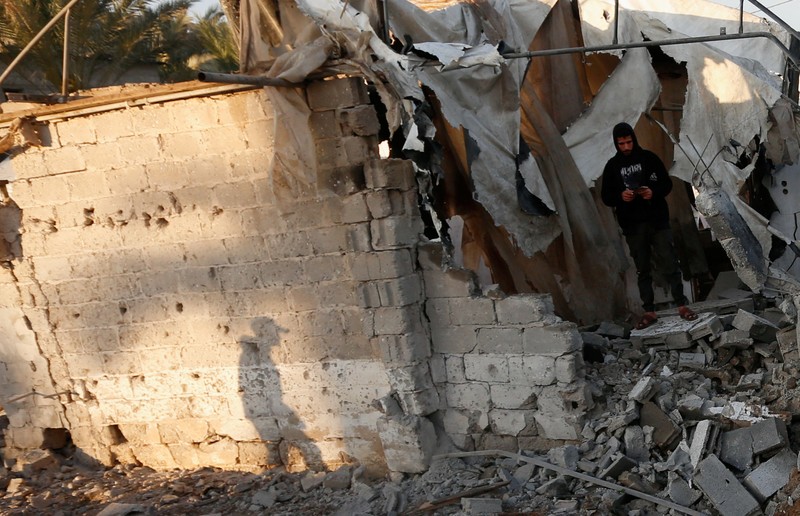 Smoke and flames rise following an Israeli strike near a tent camp sheltering displaced Palestinians in Deir al-Balah, central Gaza Strip, March 25, 2026. The Israeli military ordered camp to evacuate before the strike, according to residents. REUTERS/Stringer