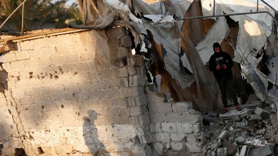 Smoke and flames rise following an Israeli strike near a tent camp sheltering displaced Palestinians in Deir al-Balah, central Gaza Strip, March 25, 2026. The Israeli military ordered camp to evacuate before the strike, according to residents. REUTERS/Stringer