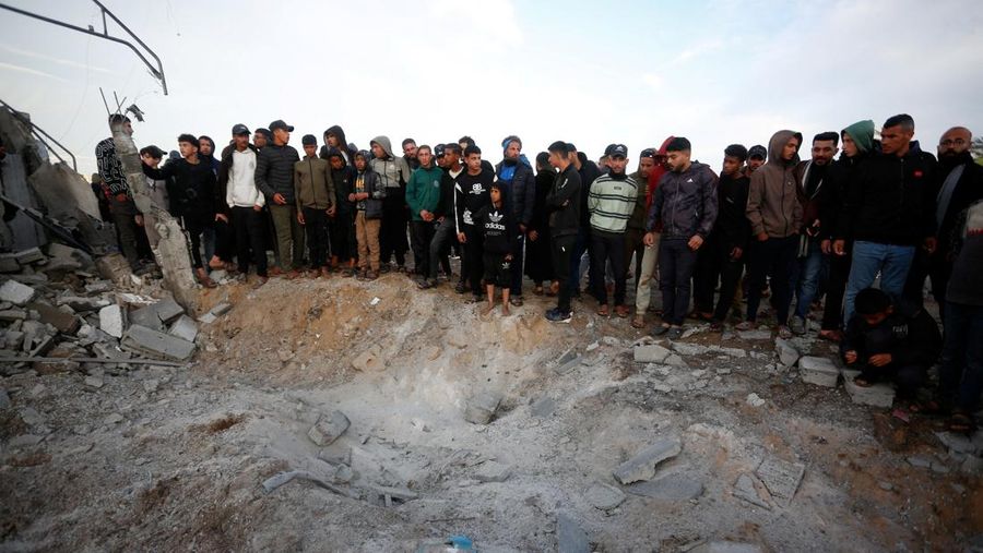 Smoke and flames rise following an Israeli strike near a tent camp sheltering displaced Palestinians in Deir al-Balah, central Gaza Strip, March 25, 2026. The Israeli military ordered camp to evacuate before the strike, according to residents. REUTERS/Stringer