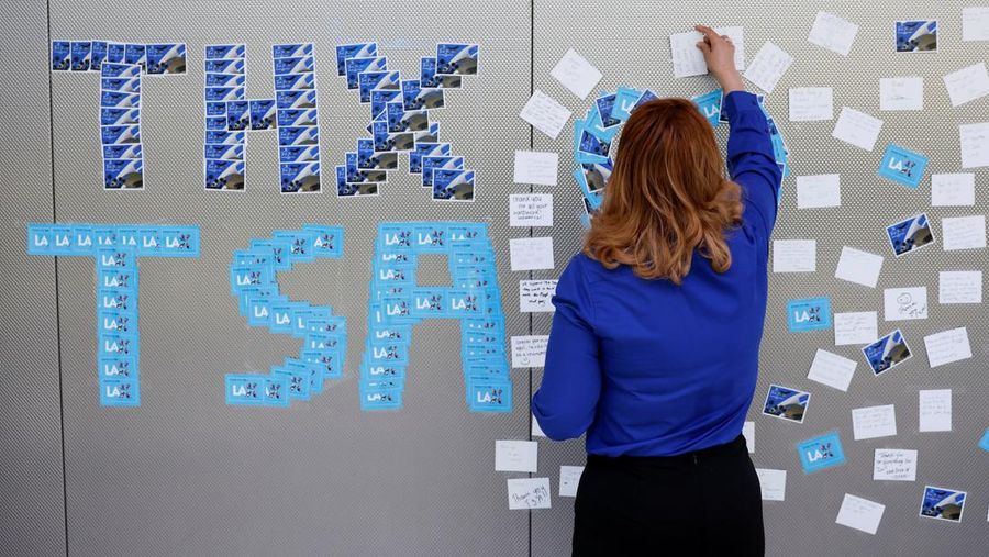 People wait in TSA security lines at New York's John F. Kennedy International Airport in Queens, New York City, U.S., March 26, 2026. Picture taken with a phone. REUTERS/Brendan McDermid