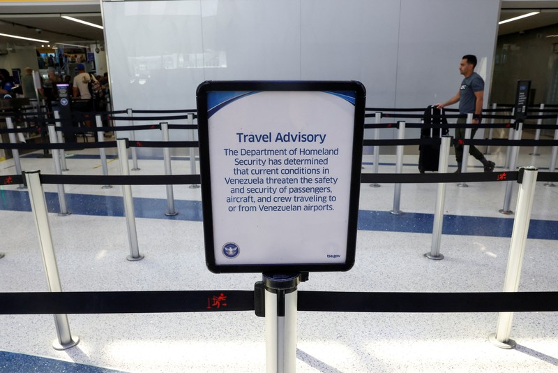 People wait in TSA security lines at New York's John F. Kennedy International Airport in Queens, New York City, U.S., March 26, 2026. Picture taken with a phone. REUTERS/Brendan McDermid