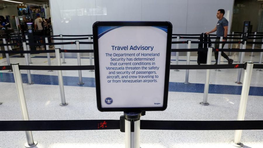 People wait in TSA security lines at New York's John F. Kennedy International Airport in Queens, New York City, U.S., March 26, 2026. Picture taken with a phone. REUTERS/Brendan McDermid