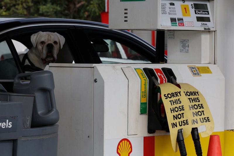 A blank fuel price board is displayed outside a Shell petrol station that ran out of fuel, in Sydney, Australia, March 30, 2026. REUTERS/Hollie Adams