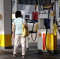 A blank fuel price board is displayed outside a Shell petrol station that ran out of fuel, in Sydney, Australia, March 30, 2026. REUTERS/Hollie Adams