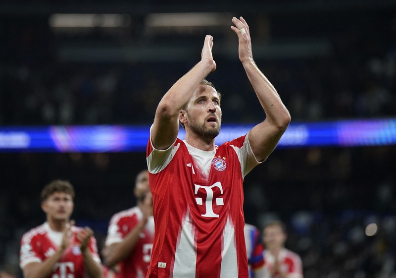 Joshua Kimmich dari Bayern Munich merayakan kemenangan setelah pertandingan melawan Real Madrid di Santiago Bernabeu, Madrid, Spanyol (7/4/2026). (REUTERS/Ana Beltran)