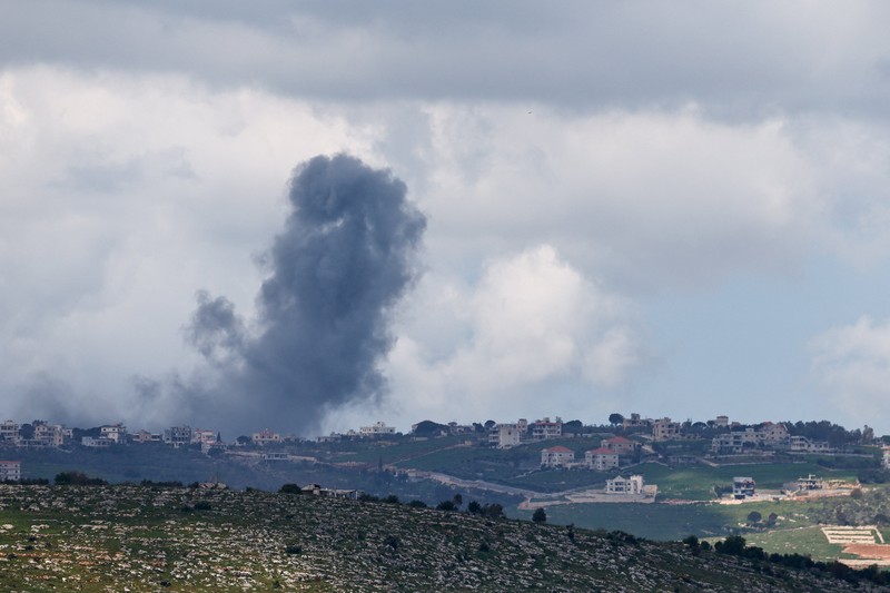 Smoke rises following an airstrike in Lebanon, as seen from Israeli side of the border, April 12, 2026. REUTERS/Amir Cohen