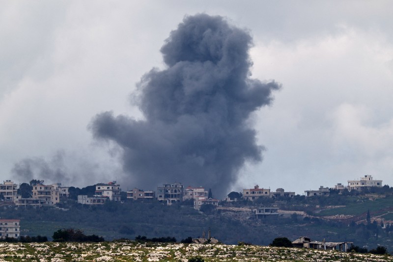 Smoke rises following an airstrike in Lebanon, as seen from Israeli side of the border, April 12, 2026. REUTERS/Amir Cohen