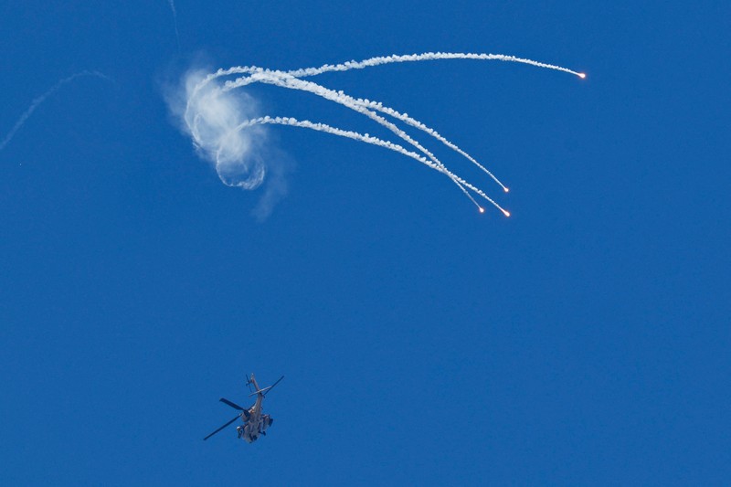 Smoke rises following an airstrike in Lebanon, as seen from Israeli side of the border, April 12, 2026. REUTERS/Amir Cohen