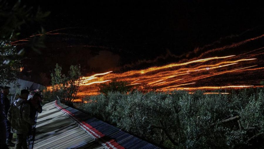 A man ignites handmade rockets during Greek Orthodox Easter celebrations in the village of Vrontados, on the island of Chios, Greece, April 11, 2026. REUTERS/Konstantinos Anagnostou