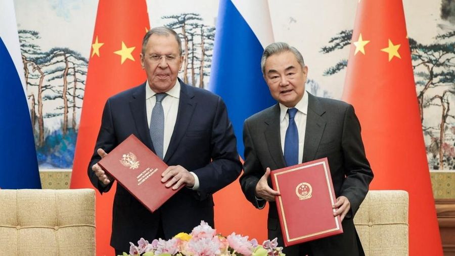 Russia&rsquo;s Foreign Minister Sergei Lavrov walks for a meeting with China&rsquo;s President Xi Jinping at the Great Hall of the People in Beijing, China April 15, 2026. Iori Sagisawa/Pool via REUTERS