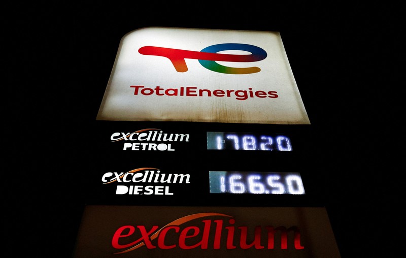 A fuel pump attendant confirms a mobile phone payment as he fuels a motorcycle taxi at a TotalEnergies petrol station ahead of an announced fuel price hike, as fuel costs rise amid global disruptions caused by the Iran war, in Nairobi, Kenya April 14, 2026. REUTERS/Thomas Mukoya