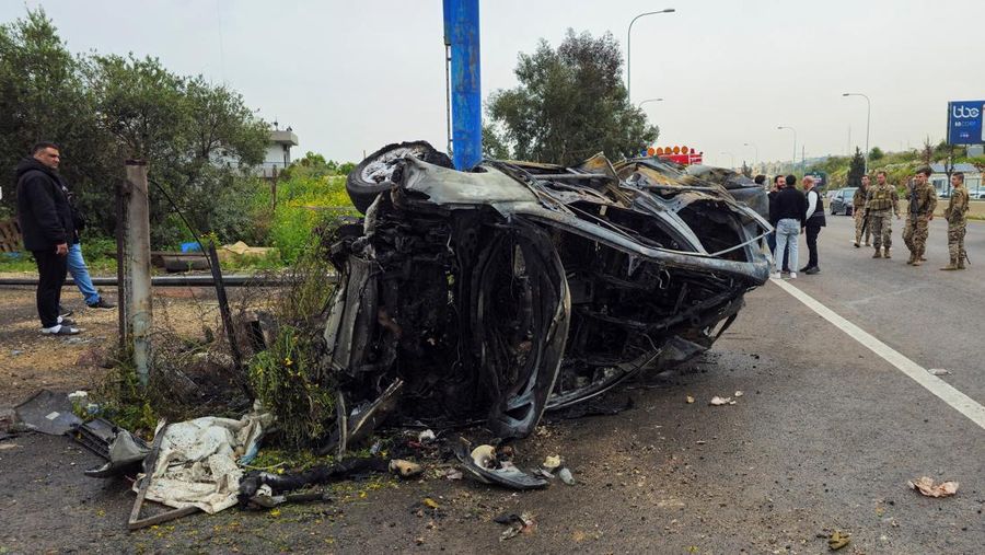 An Israeli helicopter releases flares, near the Israel-Lebanon border, as seen from the Israeli side of the border in northern Israel, April 14, 2026. REUTERS/Florion Goga REFILE - QUALITY REPEAT     TPX IMAGES OF THE DAY
