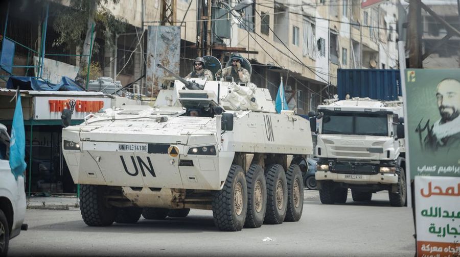 An Israeli helicopter releases flares, near the Israel-Lebanon border, as seen from the Israeli side of the border in northern Israel, April 14, 2026. REUTERS/Florion Goga REFILE - QUALITY REPEAT     TPX IMAGES OF THE DAY
