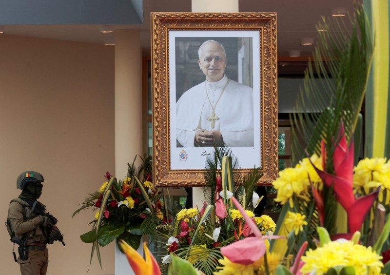 Pope Leo XIV waves as he boards a plane bound for Bamenda where he will attend a meeting for peace and hold a holy Mass, at Yaounde Nsimalen International Airport, in Yaounde, Cameroon, April 16, 2026. REUTERS/Luc Gnago