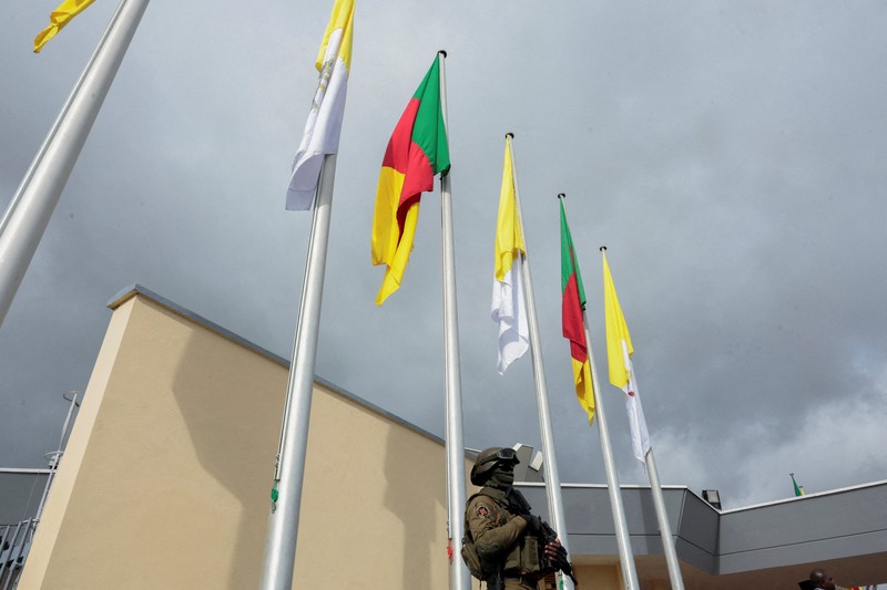Pope Leo XIV waves as he boards a plane bound for Bamenda where he will attend a meeting for peace and hold a holy Mass, at Yaounde Nsimalen International Airport, in Yaounde, Cameroon, April 16, 2026. REUTERS/Luc Gnago