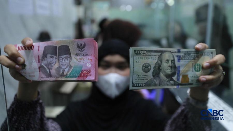 Dolar AS dan rupiah.