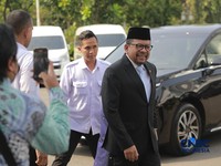 Muhammad Qodari tiba di Istana Negara, Senin (27/4/2026). (CNCB Indonesia/Muhammad Sabki)