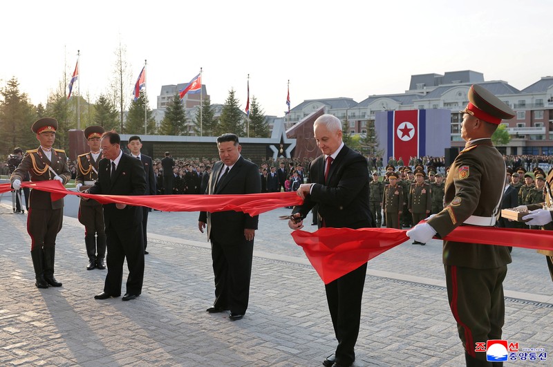 North Korean leader Kim Jong Un, Russia's Defence Minister Andrey Belousov and Russia's State Duma Chairman Vyacheslav Volodin raise a toast during a banquet hosted for the Russian delegate visiting North Korea to attend the opening ceremony of the Memorial Museum of Combat Feats at the Overseas Military Operations honouring North Korean troops killed while fighting for Russia in the war against Ukraine, in Pyongyang, North Korea, April 26, 2026, in this picture released by North Korea's official Korean Central News Agency. KCNA via REUTERS    ATTENTION EDITORS - THIS IMAGE WAS PROVIDED BY A THIRD PARTY. REUTERS IS UNABLE TO INDEPENDENTLY VERIFY THIS IMAGE. NO THIRD PARTY SALES. SOUTH KOREA OUT. NO COMMERCIAL OR EDITORIAL SALES IN SOUTH KOREA.