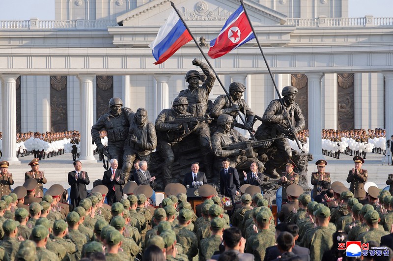 North Korean leader Kim Jong Un, Russia's Defence Minister Andrey Belousov and Russia's State Duma Chairman Vyacheslav Volodin raise a toast during a banquet hosted for the Russian delegate visiting North Korea to attend the opening ceremony of the Memorial Museum of Combat Feats at the Overseas Military Operations honouring North Korean troops killed while fighting for Russia in the war against Ukraine, in Pyongyang, North Korea, April 26, 2026, in this picture released by North Korea's official Korean Central News Agency. KCNA via REUTERS    ATTENTION EDITORS - THIS IMAGE WAS PROVIDED BY A THIRD PARTY. REUTERS IS UNABLE TO INDEPENDENTLY VERIFY THIS IMAGE. NO THIRD PARTY SALES. SOUTH KOREA OUT. NO COMMERCIAL OR EDITORIAL SALES IN SOUTH KOREA.