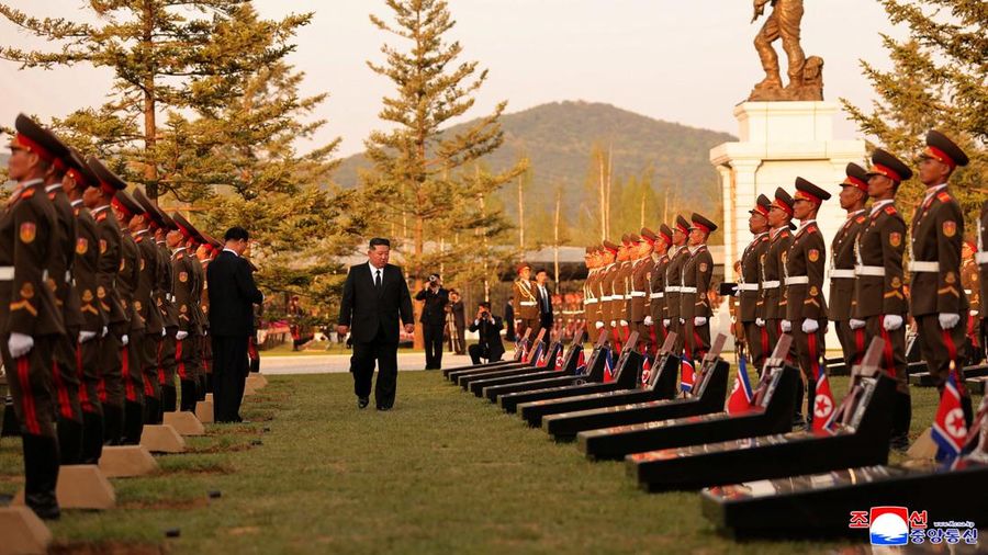 North Korean leader Kim Jong Un walks next to memorial stones during the opening ceremony of the Memorial Museum of Combat Feats at the Overseas Military Operations honouring North Korean troops killed while fighting for Russia in the war against Ukr